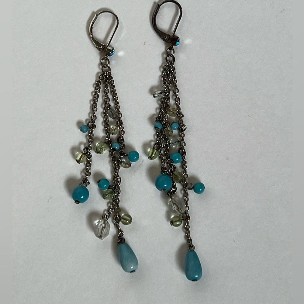 Silver with turquoise beads and clear beads dangling earrings.